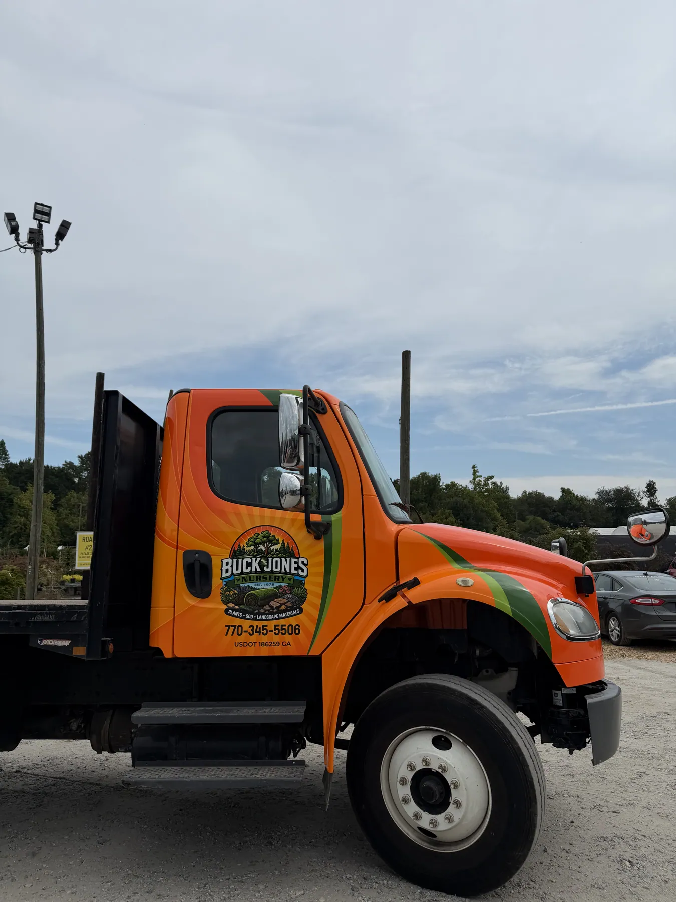 Orange commercial truck door graphics