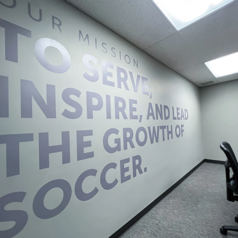 Office mission statement wall lettering