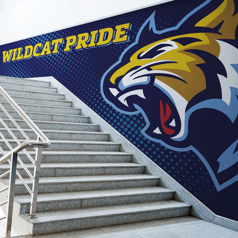 Wildcat Pride branded stairwell wall